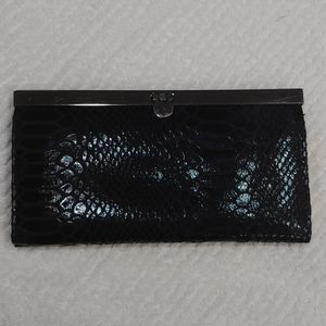 NWOT!!! Beautiful Shiney Black Clutch!!!